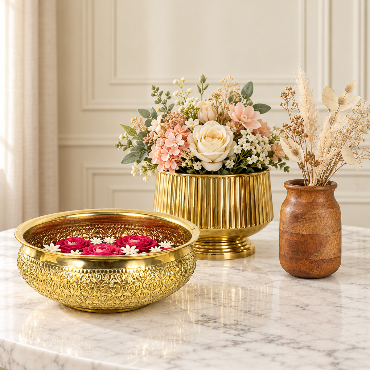 Modini chitai gold urli, fluted pedestal planter and walnut mango wood vase, photographed on marble