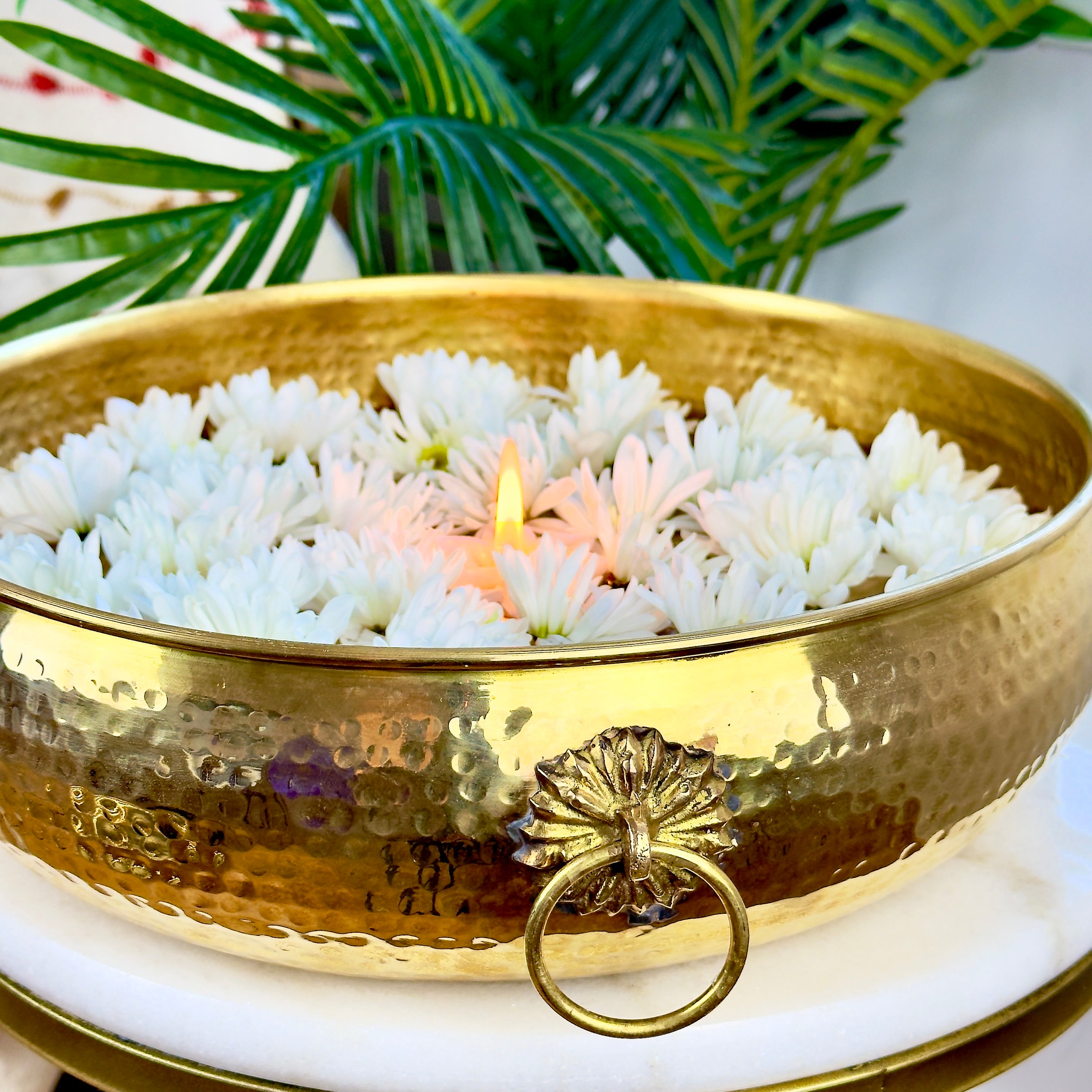 Product image of a Brass Hammered Classic Urli from Indian Impressions, featuring a traditional hammered texture that enhances its rustic charm. The urli is crafted from polished brass, making it ideal for home décor, spiritual rituals, or gifting, bringing an elegant and timeless appeal to any space.
