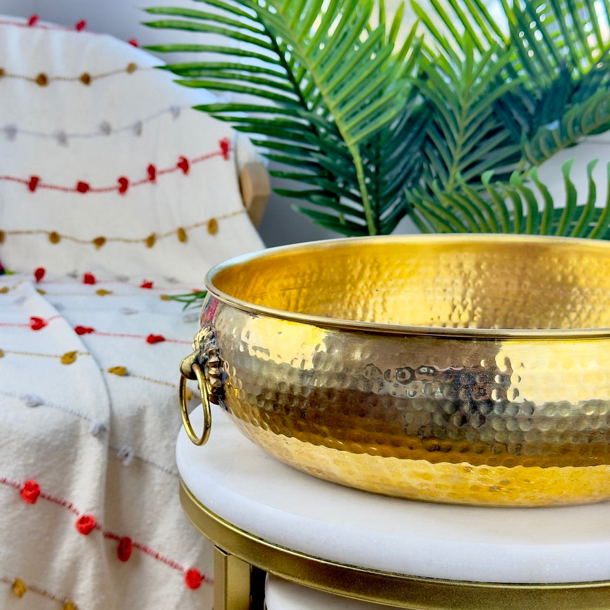 Product image of a Brass Hammered Classic Urli from Indian Impressions, featuring a traditional hammered texture that enhances its rustic charm. The urli is crafted from polished brass, making it ideal for home décor, spiritual rituals, or gifting, bringing an elegant and timeless appeal to any space.
