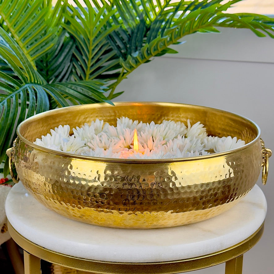 Product image of a Brass Hammered Classic Urli from Indian Impressions, featuring a traditional hammered texture that enhances its rustic charm. The urli is crafted from polished brass, making it ideal for home décor, spiritual rituals, or gifting, bringing an elegant and timeless appeal to any space.
