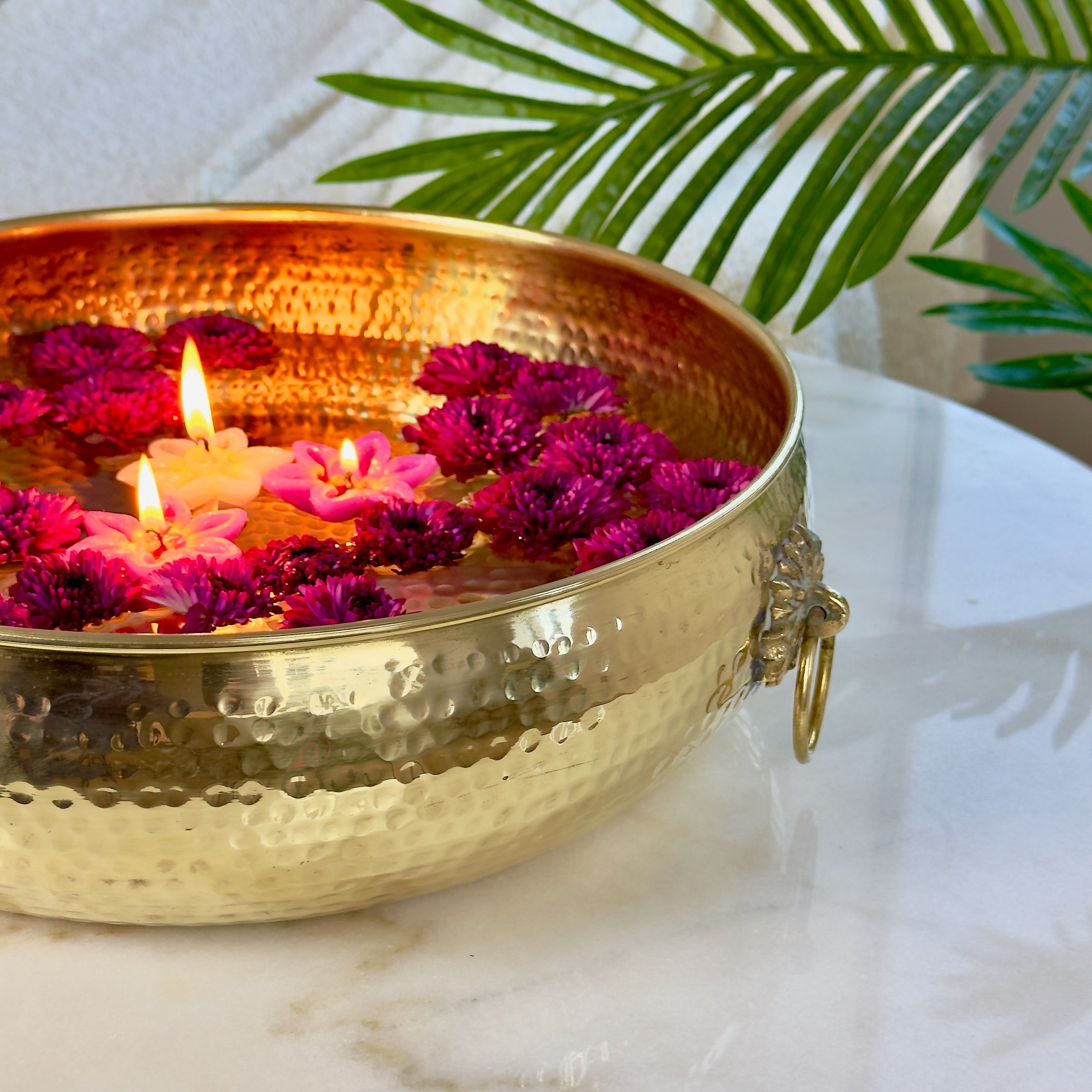Product image of a Brass Hammered Classic Urli from Indian Impressions, featuring a traditional hammered texture that enhances its rustic charm. The urli is crafted from polished brass, making it ideal for home décor, spiritual rituals, or gifting, bringing an elegant and timeless appeal to any space.