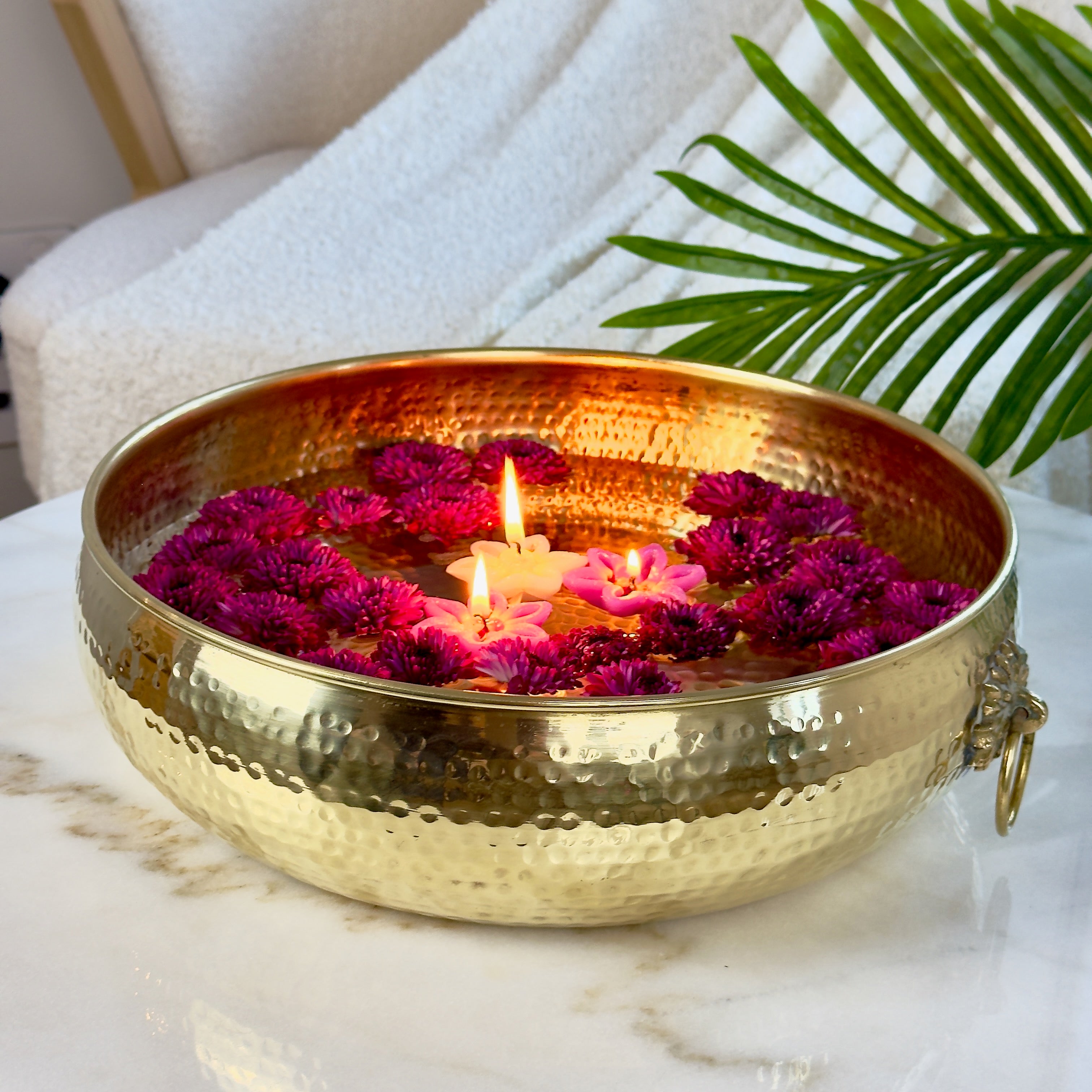 Product image of a Brass Hammered Classic Urli from Indian Impressions, featuring a traditional hammered texture that enhances its rustic charm. The urli is crafted from polished brass, making it ideal for home décor, spiritual rituals, or gifting, bringing an elegant and timeless appeal to any space.