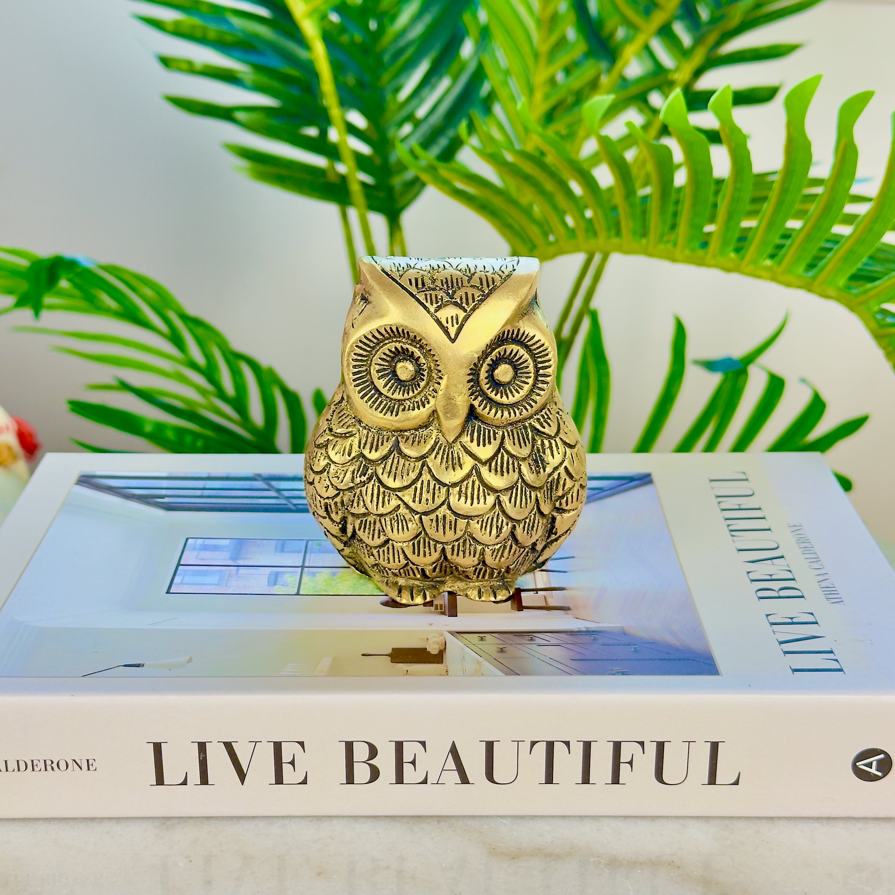 Product image of the Brass Owl Statue from Indian Impressions, featuring a finely detailed owl symbolizing wisdom and protection. Ideal for Vastu, home décor, or gifting, this handcrafted piece brings positive energy and elegance to any space.