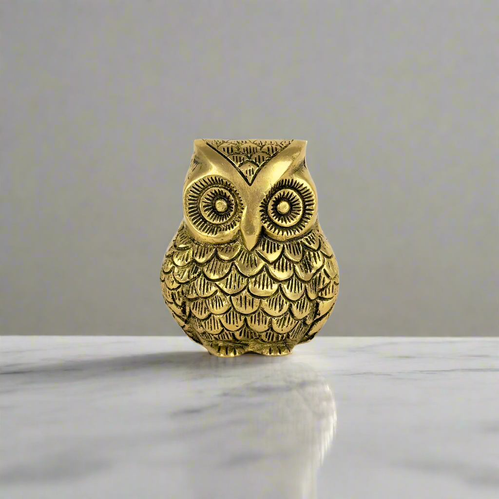 Product image of the Brass Owl Statue from Indian Impressions, featuring a finely detailed owl symbolizing wisdom and protection. Ideal for Vastu, home décor, or gifting, this handcrafted piece brings positive energy and elegance to any space.