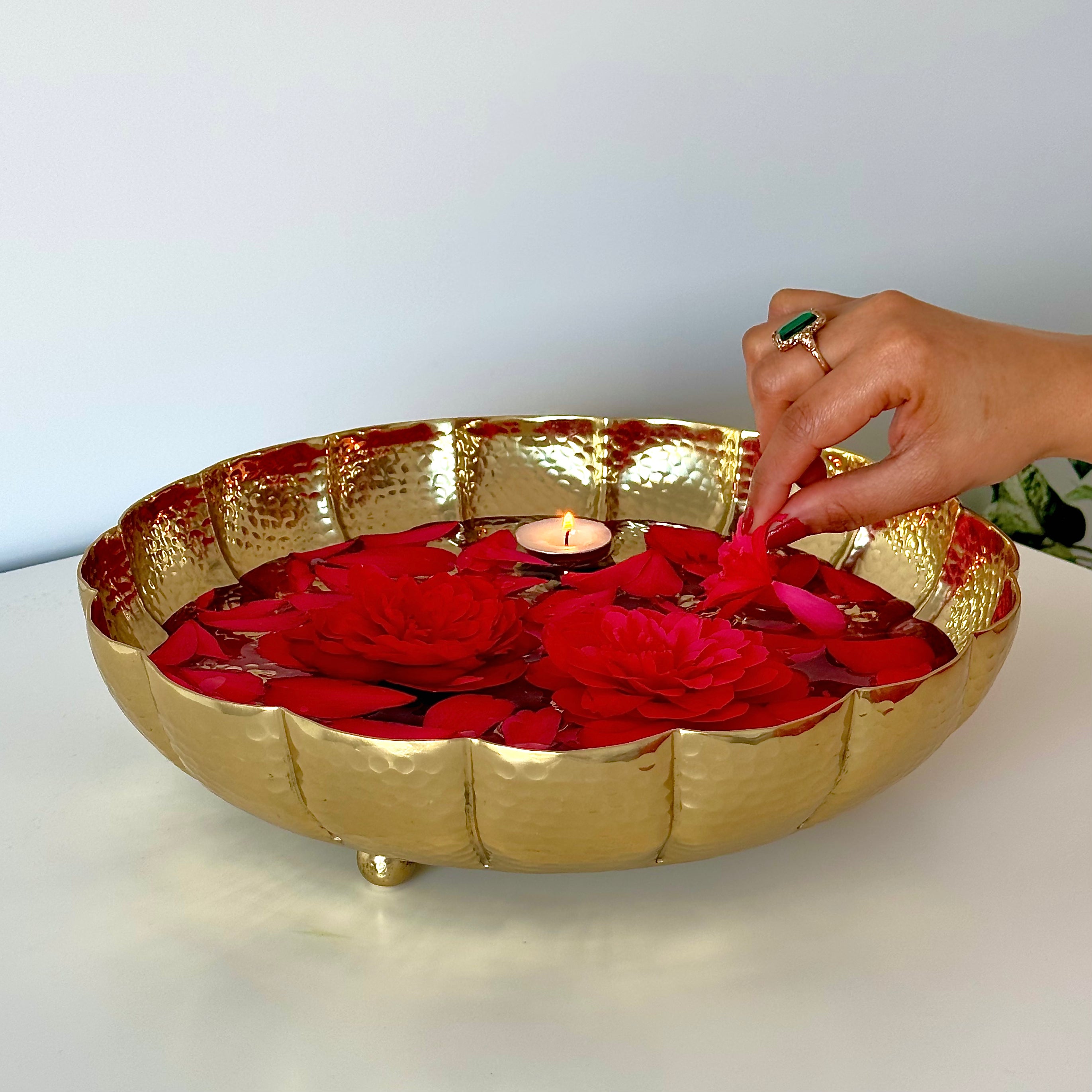 Product image of the Juhi Urli from Indian Impressions, featuring a sleek, handcrafted design with a polished gold-colored finish. Made from aluminum, this lightweight urli is perfect for Vastu, home décor, festive decorations, or gifting, adding a touch of elegance and positivity to any space.