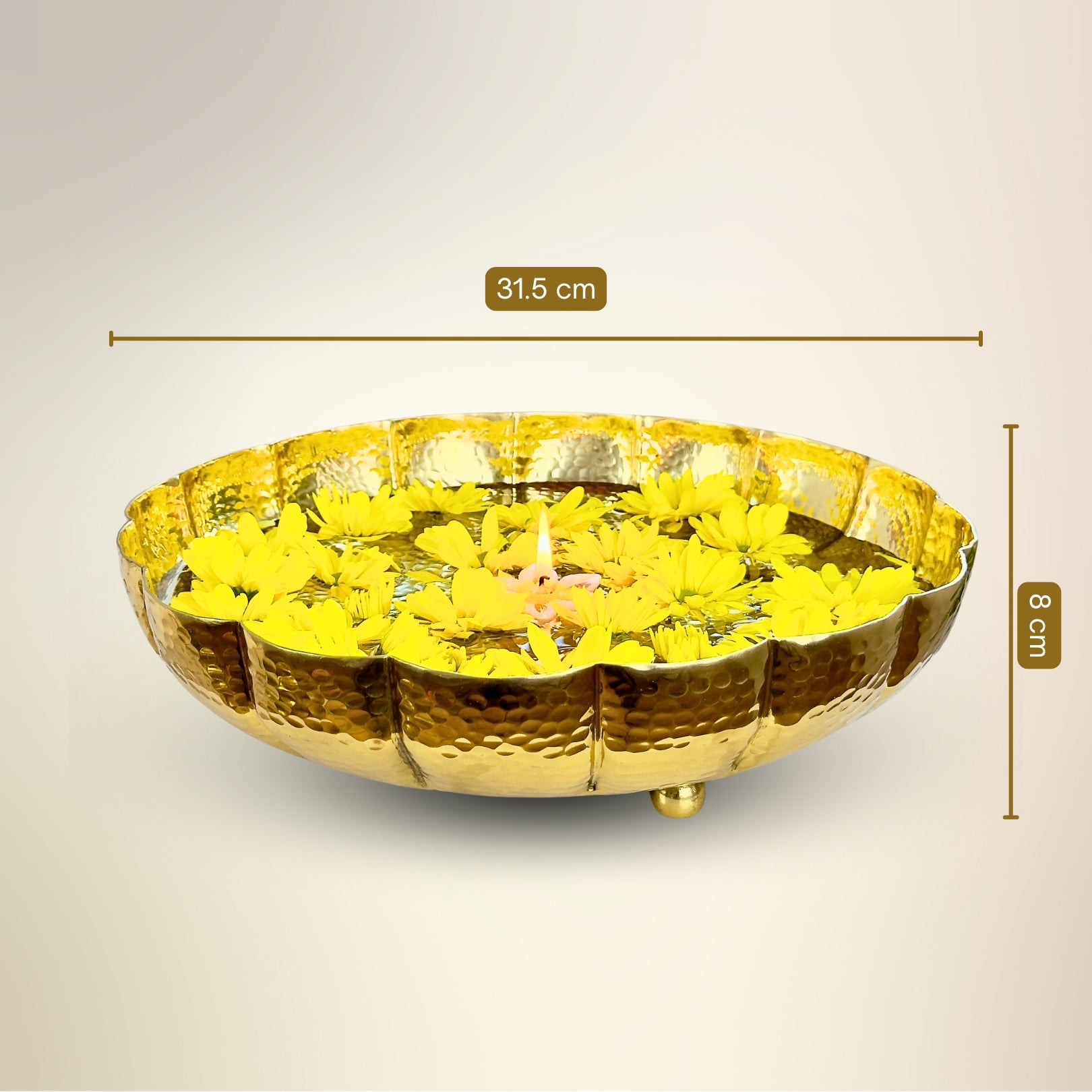 Product image of the Juhi Urli from Indian Impressions, featuring a sleek, handcrafted design with a polished gold-colored finish. Made from aluminum, this lightweight urli is perfect for Vastu, home décor, festive decorations, or gifting, adding a touch of elegance and positivity to any space.