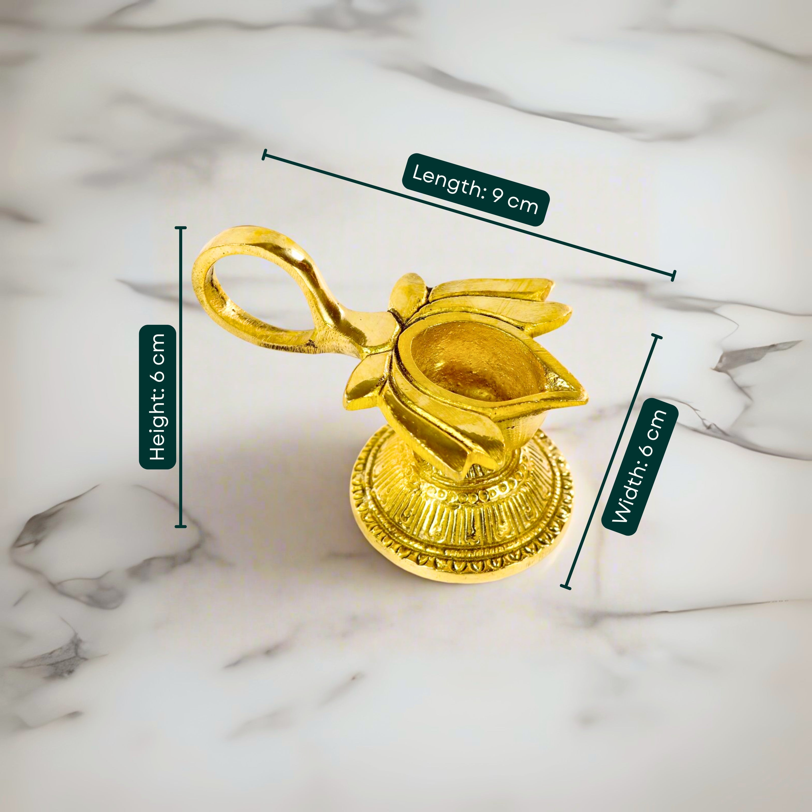 Product image of a Brass Lotus Diya with Handle from Indian Impressions, featuring a beautifully crafted lotus design and a sturdy handle for ease of use. Made from polished brass, this diya is ideal for Vastu, spiritual rituals, home décor, or gifting, symbolizing purity, positivity, and divine light.