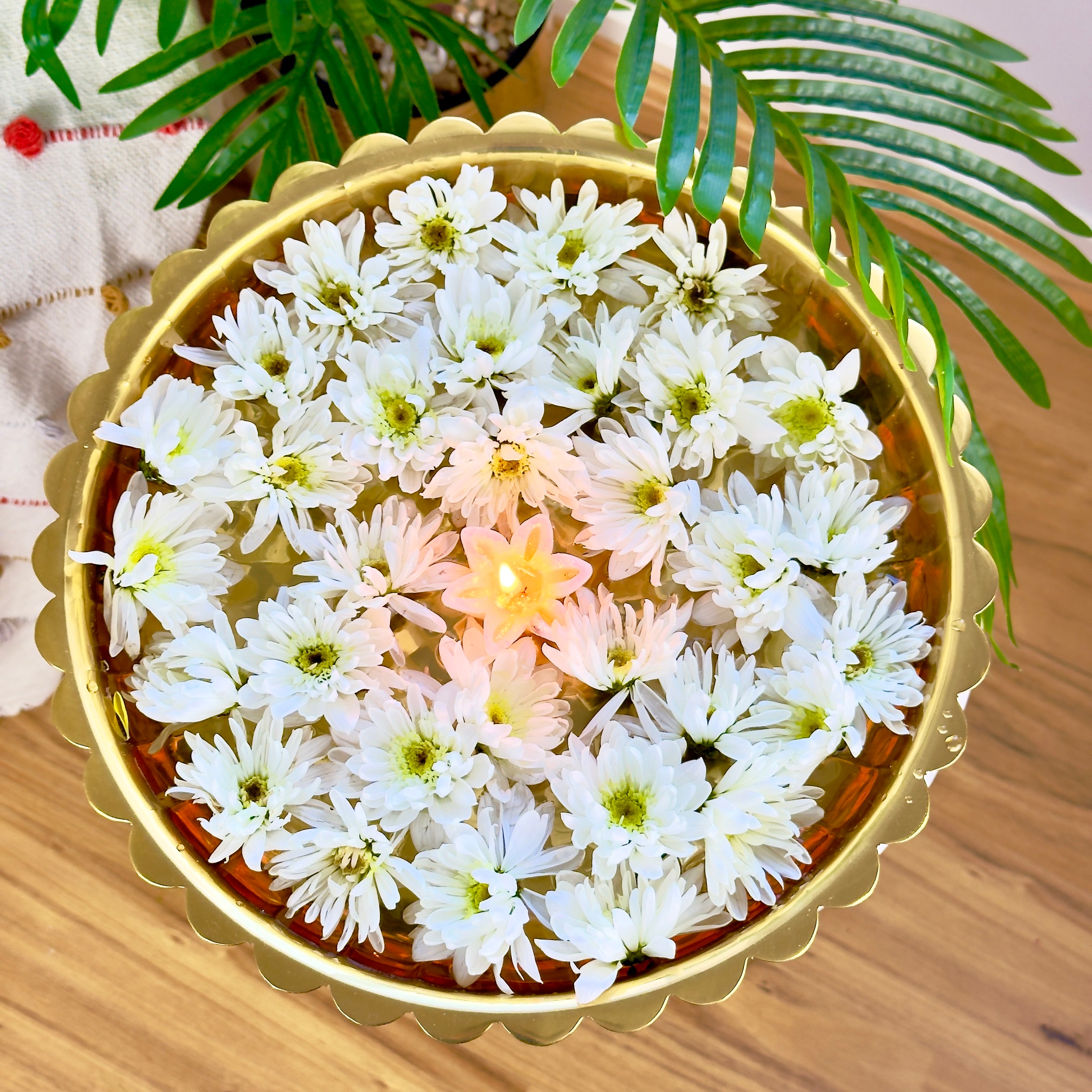 Product image of the Lotus Urli Gold from Indian Impressions, featuring a stunning lotus-inspired design with intricate detailing. Crafted with a polished gold finish, this urli is perfect for Vastu, home décor, festive decorations, or gifting, bringing elegance and positive energy to any space.