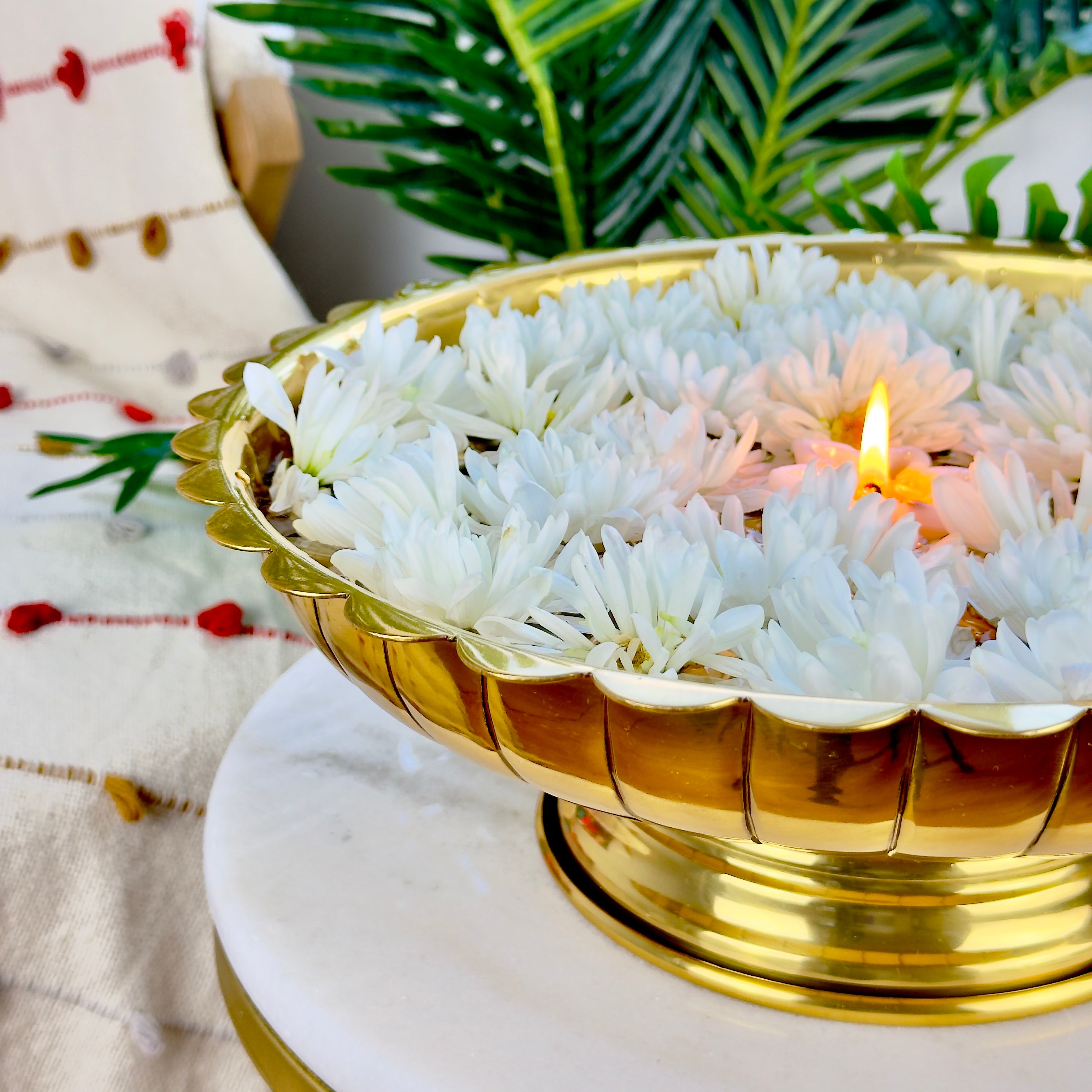 Product image of the Lotus Urli Gold from Indian Impressions, featuring a stunning lotus-inspired design with intricate detailing. Crafted with a polished gold finish, this urli is perfect for Vastu, home décor, festive decorations, or gifting, bringing elegance and positive energy to any space.