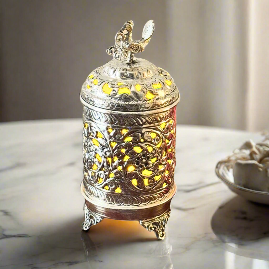 Product image of the Mayur Jyoti Dhuna in German Silver from Indian Impressions, featuring an intricately designed peacock-shaped incense burner that can also be used as a diya. Ideal for Vastu, spiritual rituals, and home décor, bringing positivity, elegance, and a divine ambiance to any space.