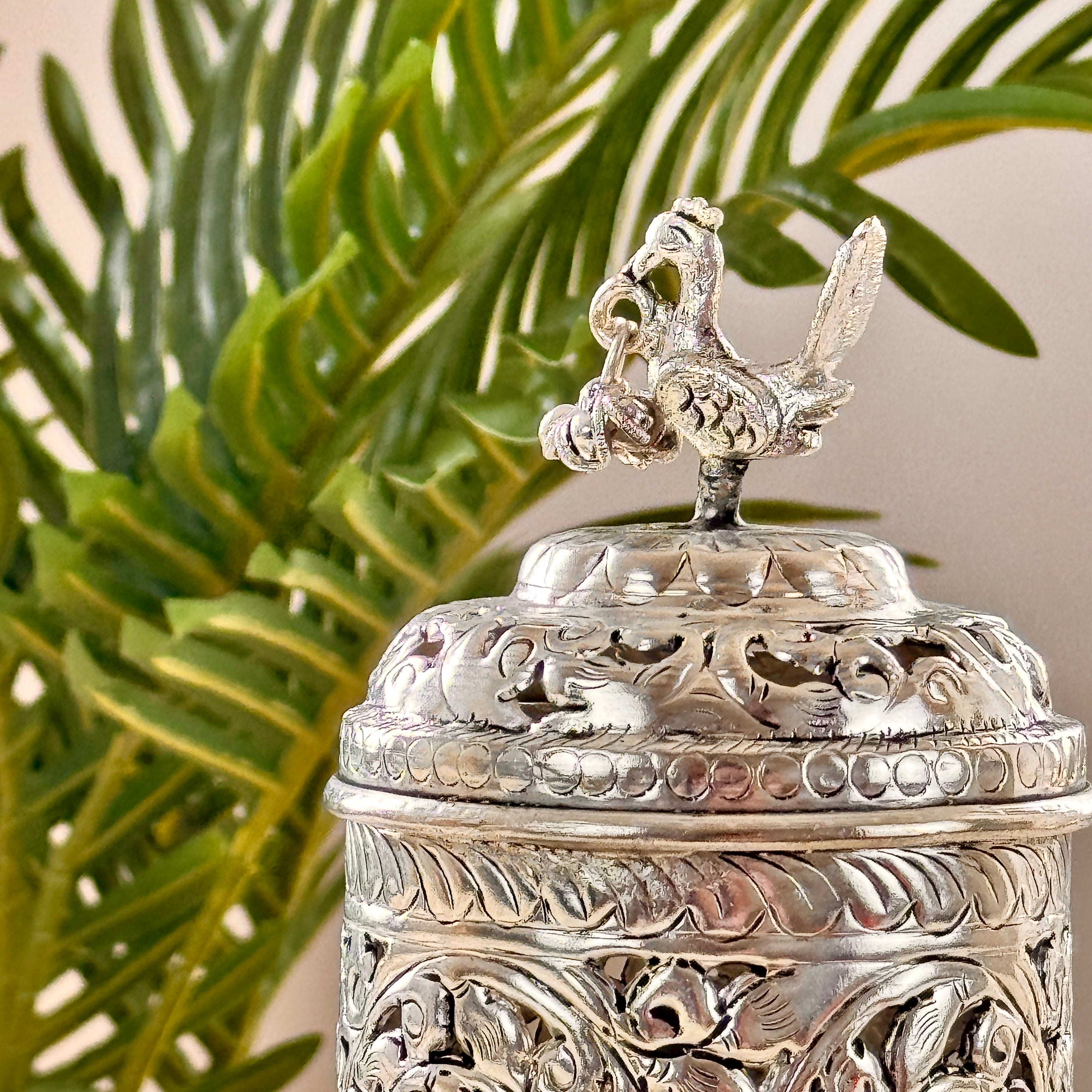 Product image of the Mayur Jyoti Dhuna in German Silver from Indian Impressions, featuring an intricately designed peacock-shaped incense burner that can also be used as a diya. Ideal for Vastu, spiritual rituals, and home décor, bringing positivity, elegance, and a divine ambiance to any space.