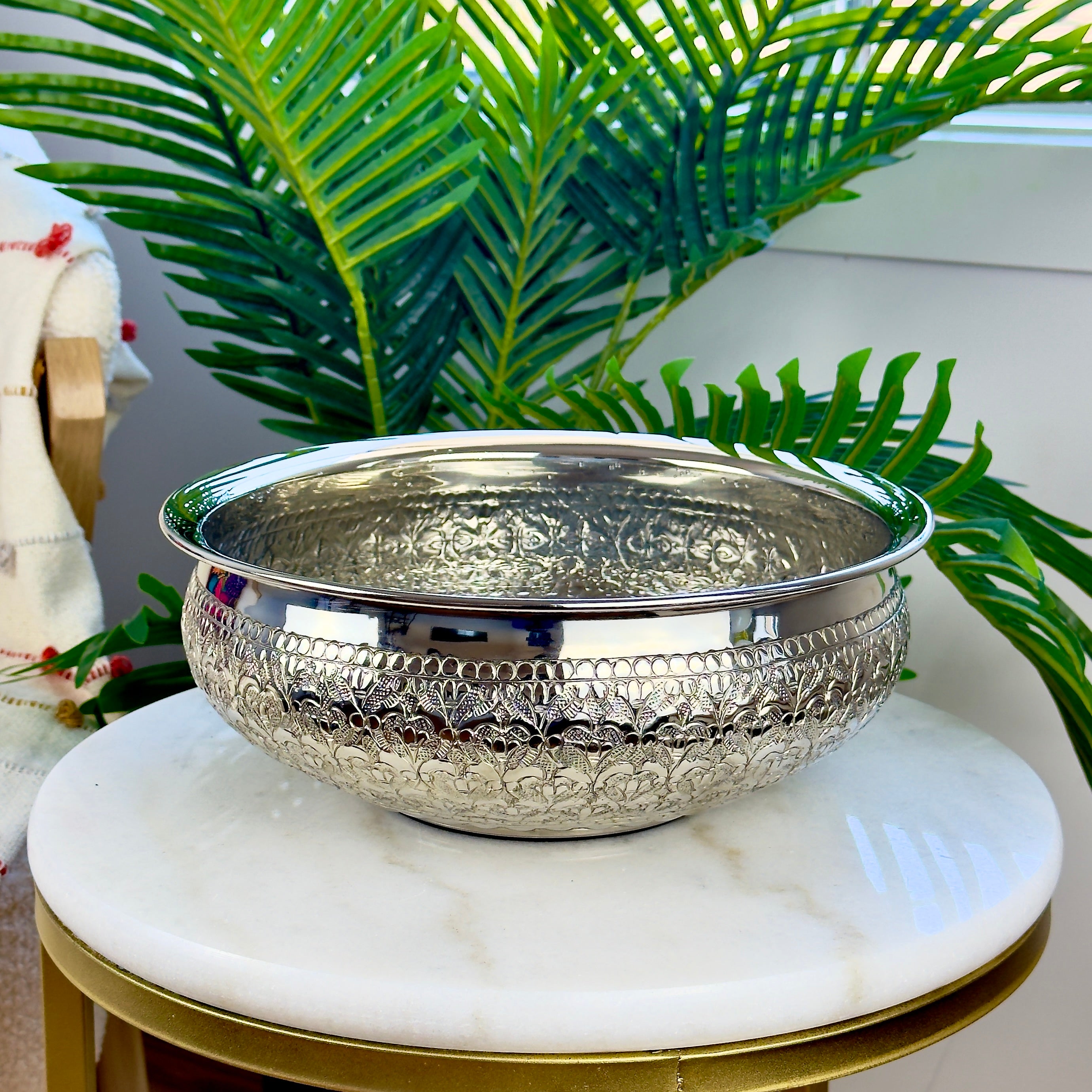 Product image of the Modini Chitai Urli Silver from Indian Impressions, showcasing an intricately handcrafted design with detailed patterns. Made with a polished silver-tone finish, this urli is perfect for Vastu, home décor, festive decorations, or gifting, bringing elegance and positive energy to any space.