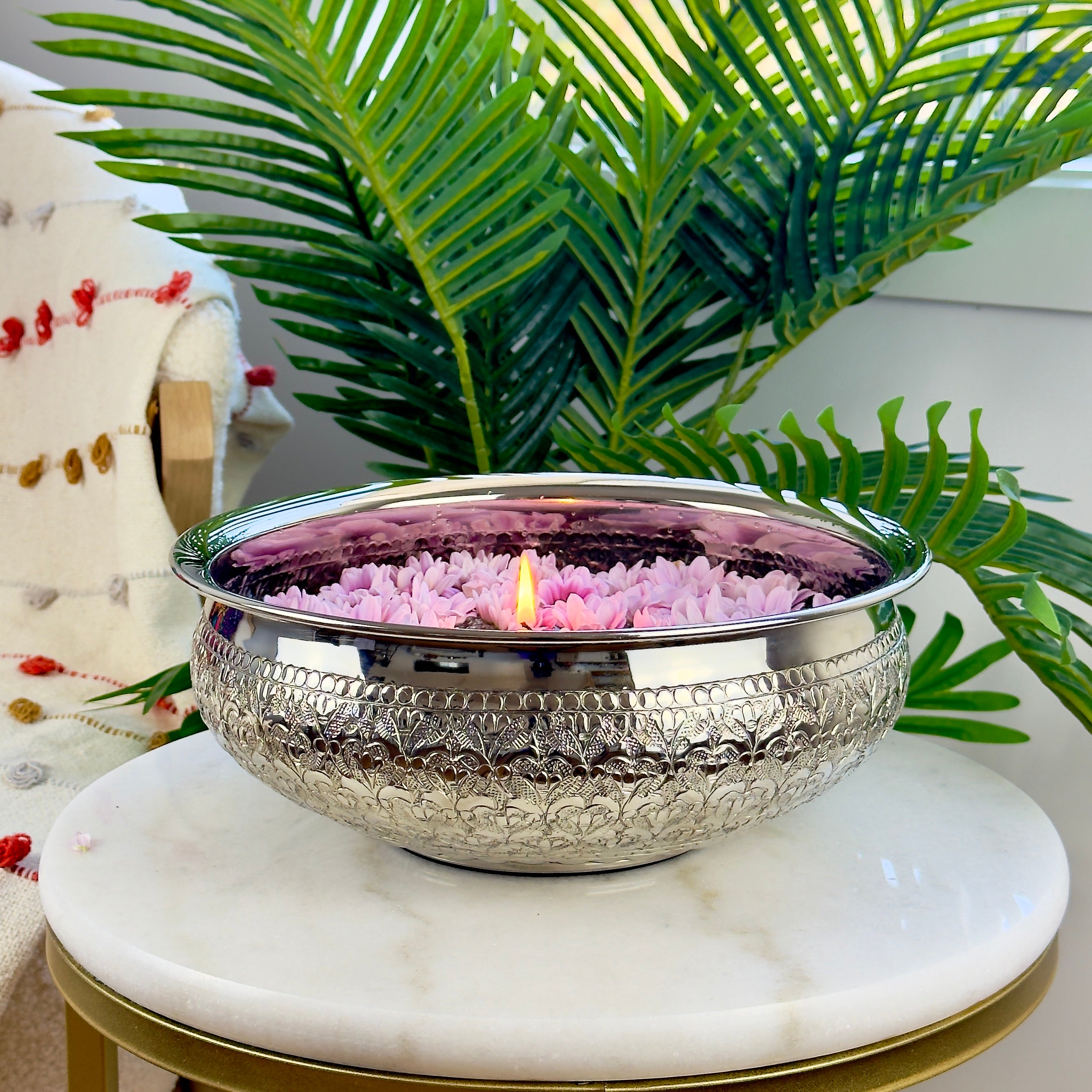 Product image of the Modini Chitai Urli Silver from Indian Impressions, showcasing an intricately handcrafted design with detailed patterns. Made with a polished silver-tone finish, this urli is perfect for Vastu, home décor, festive decorations, or gifting, bringing elegance and positive energy to any space.