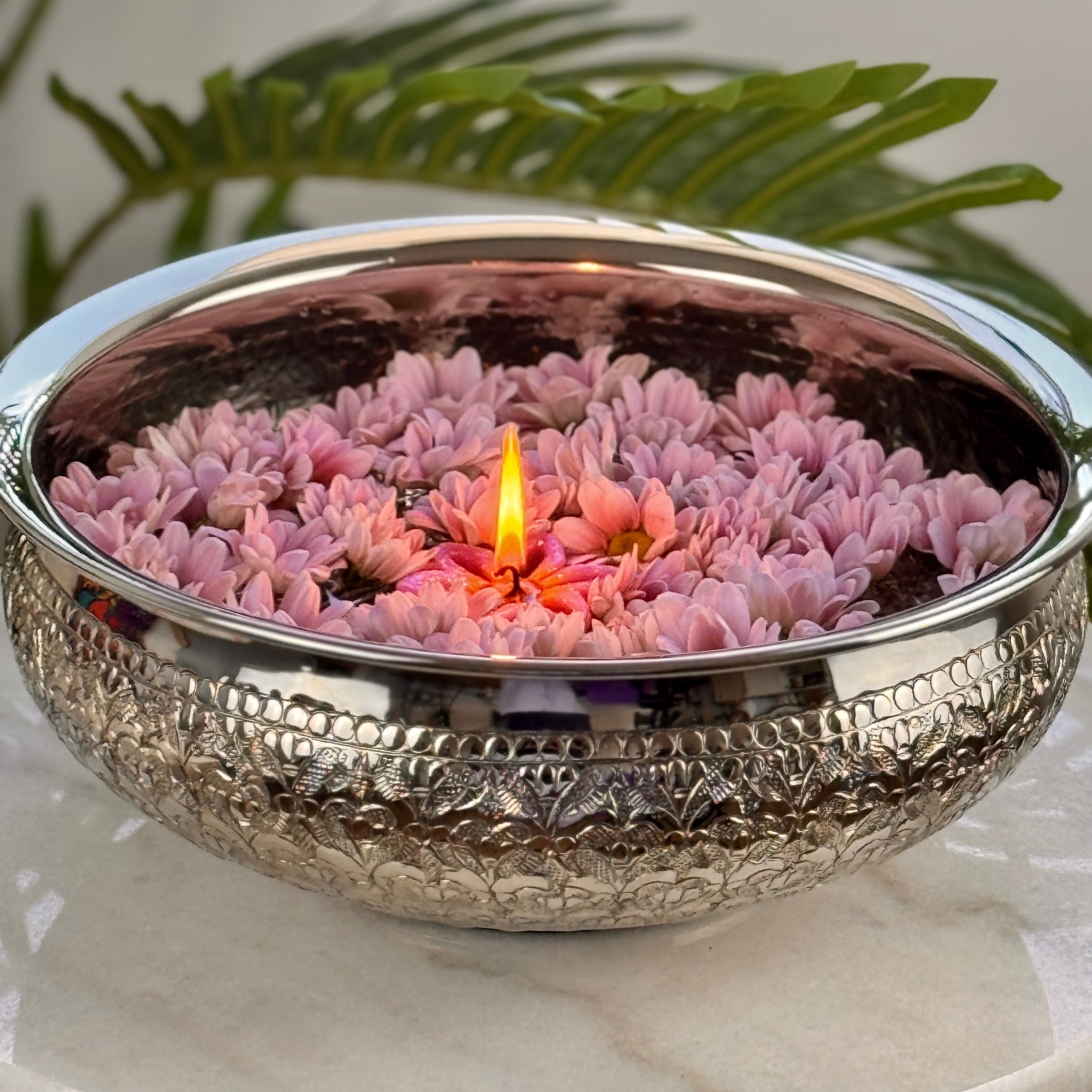 Product image of the Modini Chitai Urli Silver from Indian Impressions, showcasing an intricately handcrafted design with detailed patterns. Made with a polished silver-tone finish, this urli is perfect for Vastu, home décor, festive decorations, or gifting, bringing elegance and positive energy to any space.