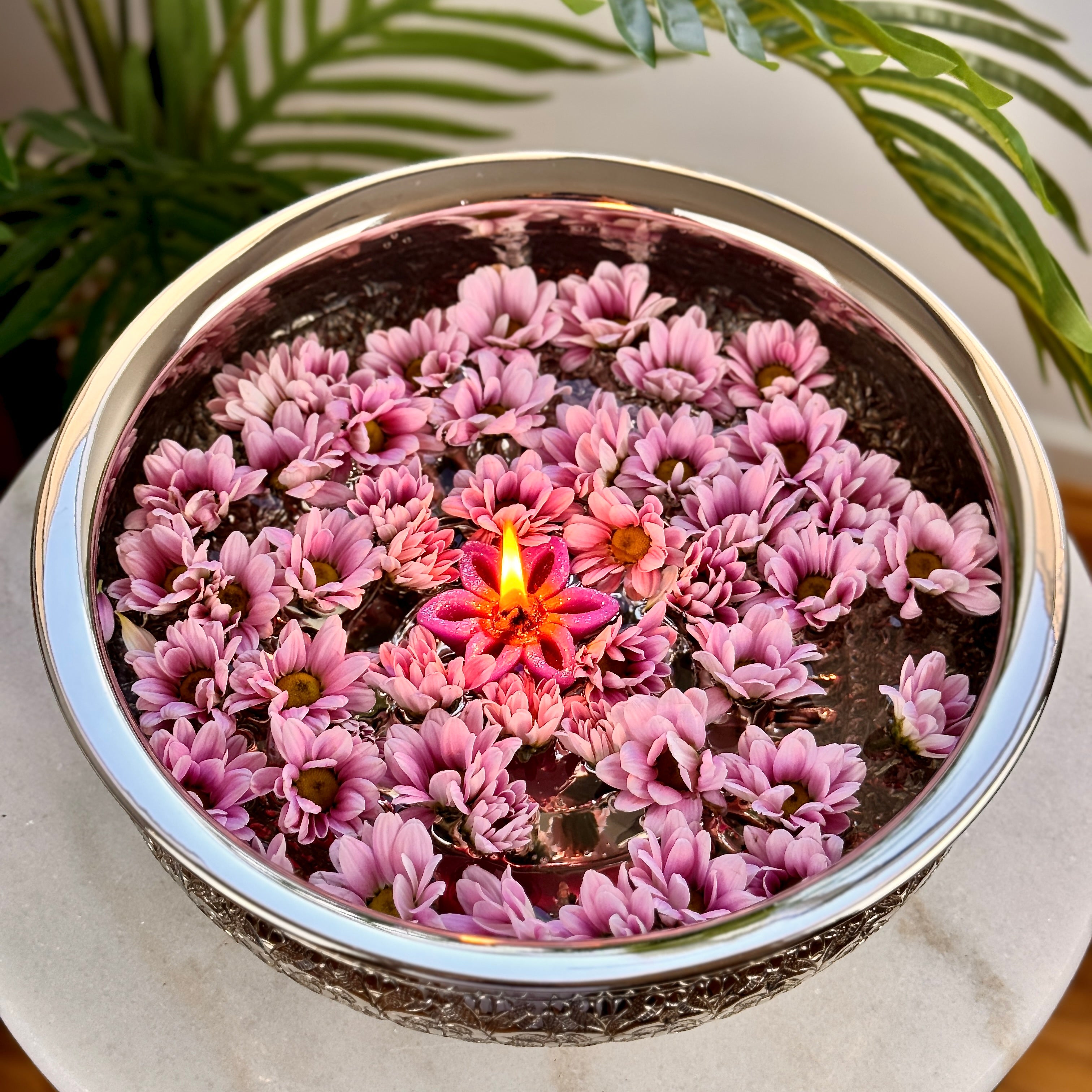 Product image of the Modini Chitai Urli Silver from Indian Impressions, showcasing an intricately handcrafted design with detailed patterns. Made with a polished silver-tone finish, this urli is perfect for Vastu, home décor, festive decorations, or gifting, bringing elegance and positive energy to any space.