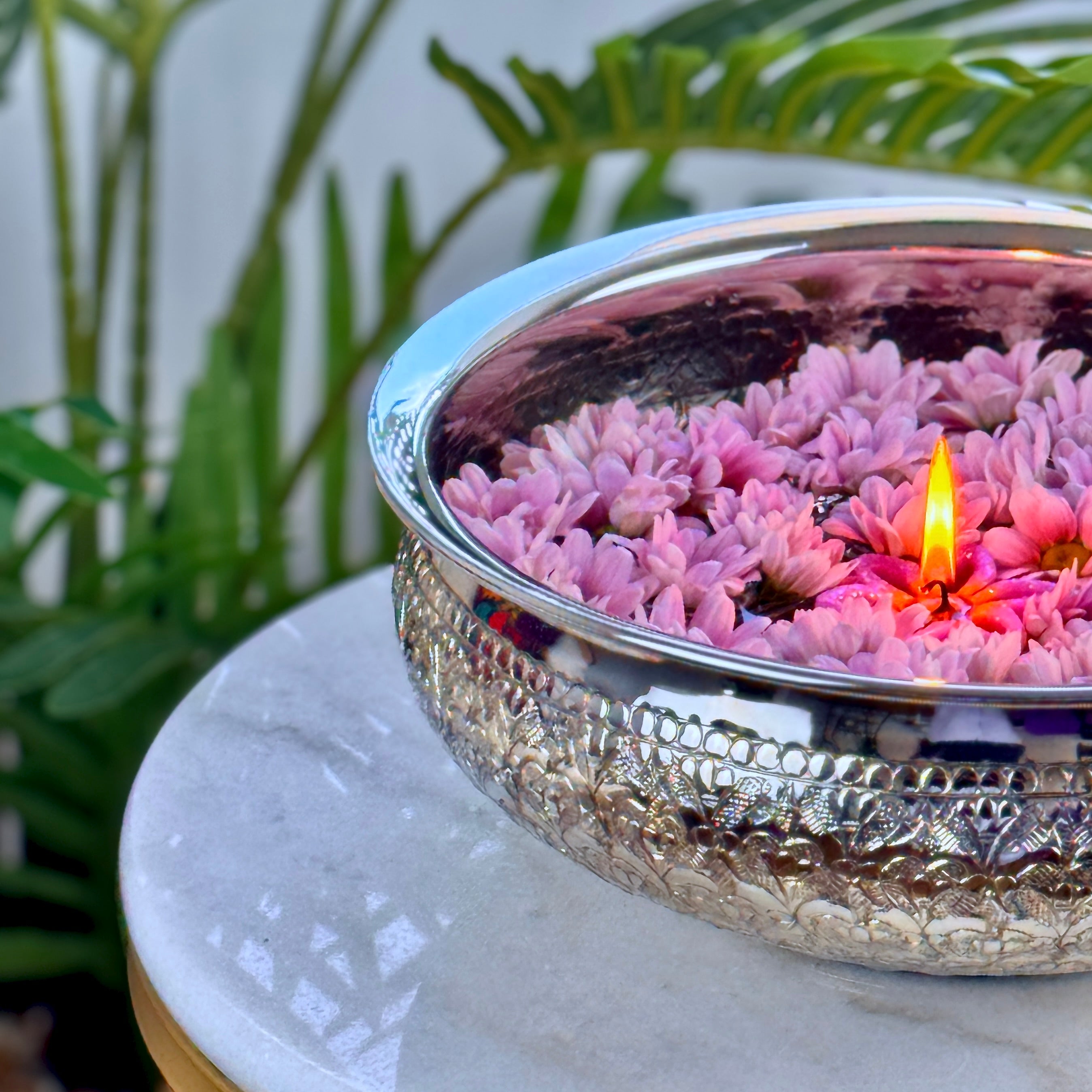 Product image of the Modini Chitai Urli Silver from Indian Impressions, showcasing an intricately handcrafted design with detailed patterns. Made with a polished silver-tone finish, this urli is perfect for Vastu, home décor, festive decorations, or gifting, bringing elegance and positive energy to any space.