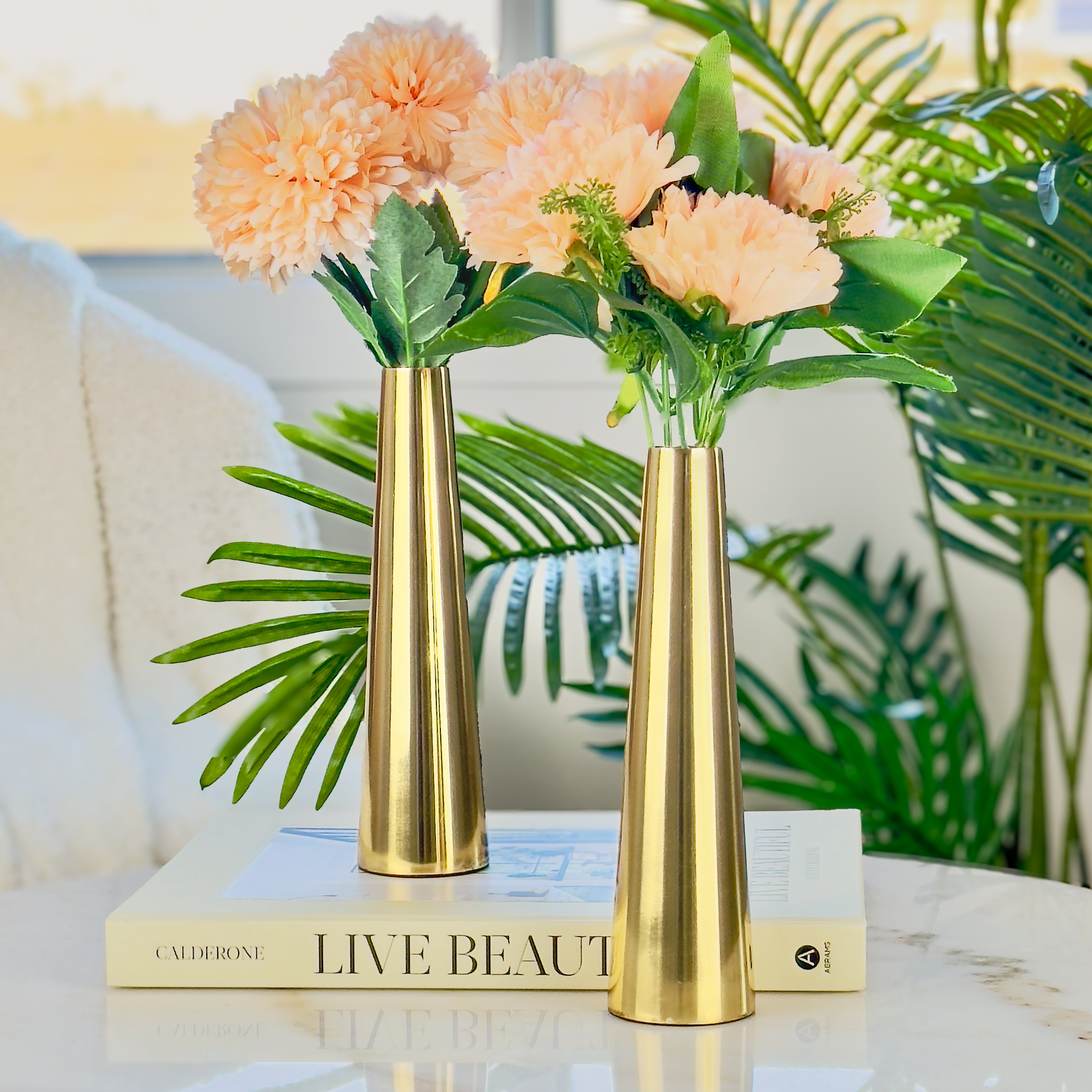 Product image of a Gold Slim Cone Vase Set of 2 from Indian Impressions, featuring sleek, modern designs with a polished gold finish. These vases are ideal for displaying flowers or as standalone decorative pieces. Perfect for enhancing Vastu energy, home décor, or gifting, adding elegance and sophistication to any space.