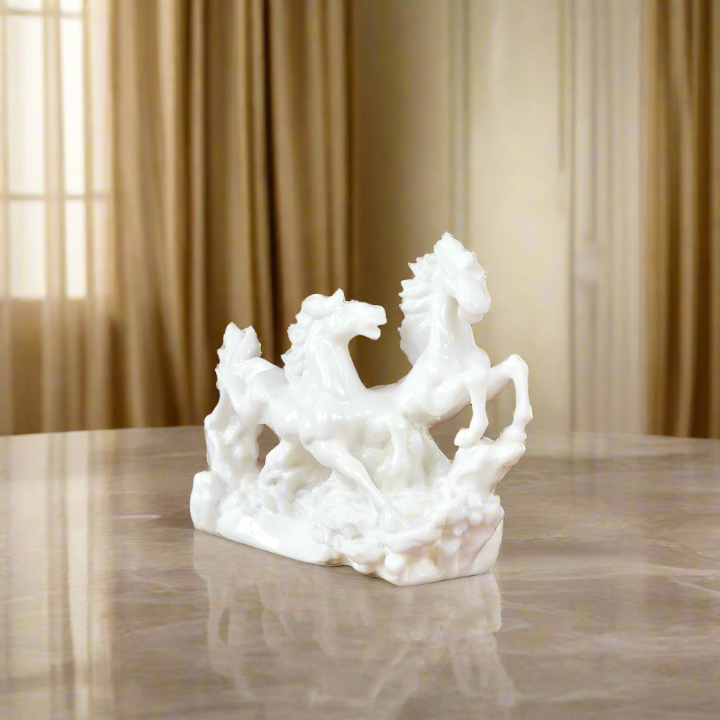 Product image of the Vastu Two White Horses from Indian Impressions, featuring two beautifully crafted white horse figurines symbolizing power, success, and positive energy. Perfect for Vastu corrections, home décor, or gifting, these horses add elegance and harmony to any space, bringing good fortune and strength.