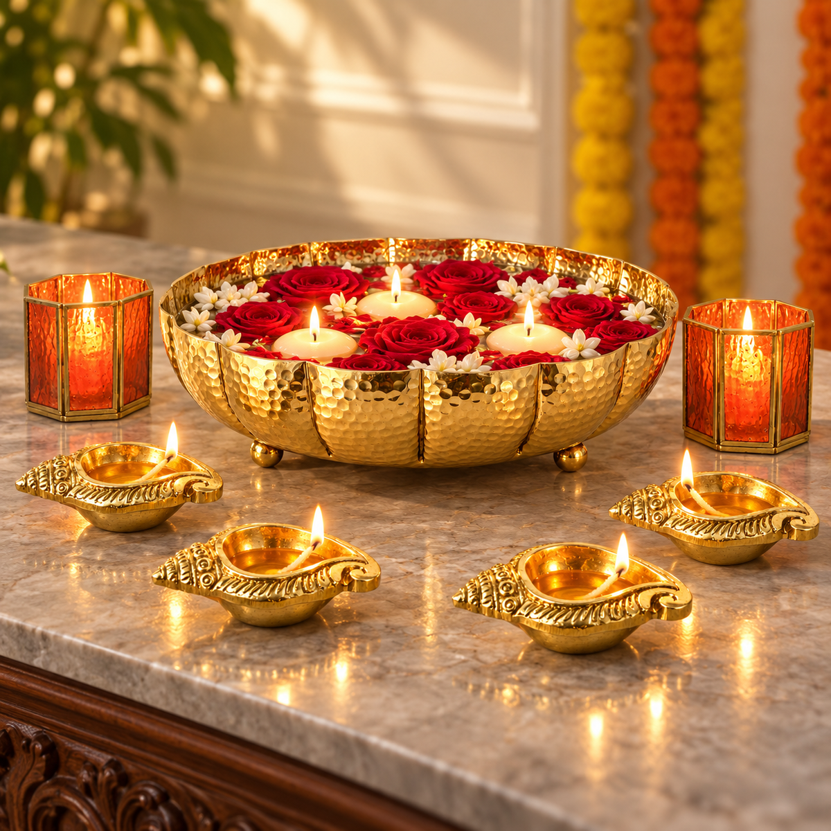 Juhi urli festive set with red and white flowers against a marigold garland backdrop