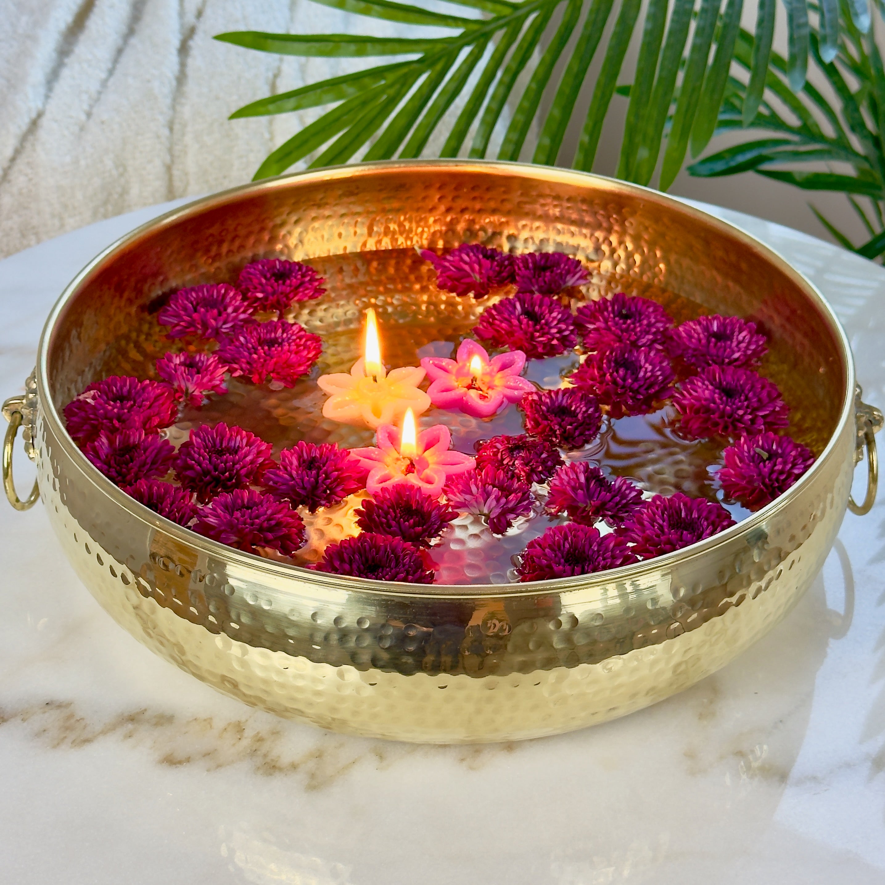 Product image of a Brass Hammered Classic Urli from Indian Impressions, featuring a traditional hammered texture that enhances its rustic charm. The urli is crafted from polished brass, making it ideal for home décor, spiritual rituals, or gifting, bringing an elegant and timeless appeal to any space.