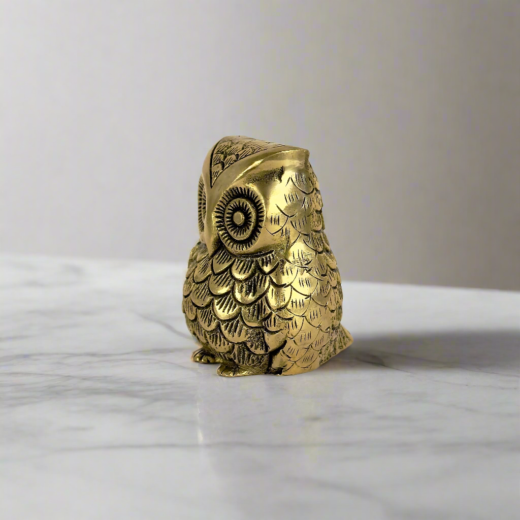 Product image of the Brass Owl Statue from Indian Impressions, featuring a finely detailed owl symbolizing wisdom and protection. Ideal for Vastu, home décor, or gifting, this handcrafted piece brings positive energy and elegance to any space.