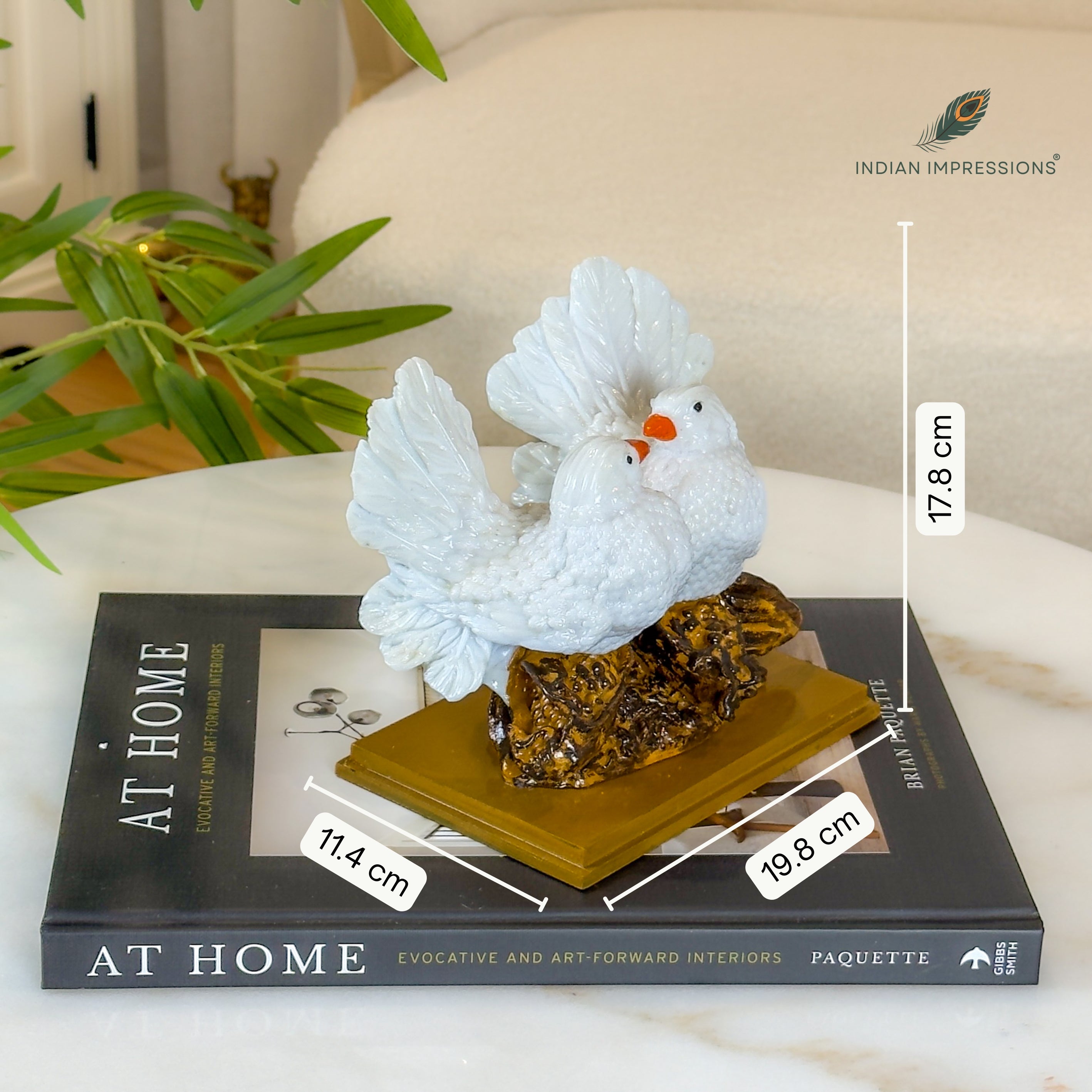 Product image of the Love Birds Pair from Indian Impressions, featuring two intricately crafted brass birds in a loving posture. The polished brass finish adds elegance, making it perfect for Vastu, home décor, or gifting to symbolize love, harmony, and positivity in any space.