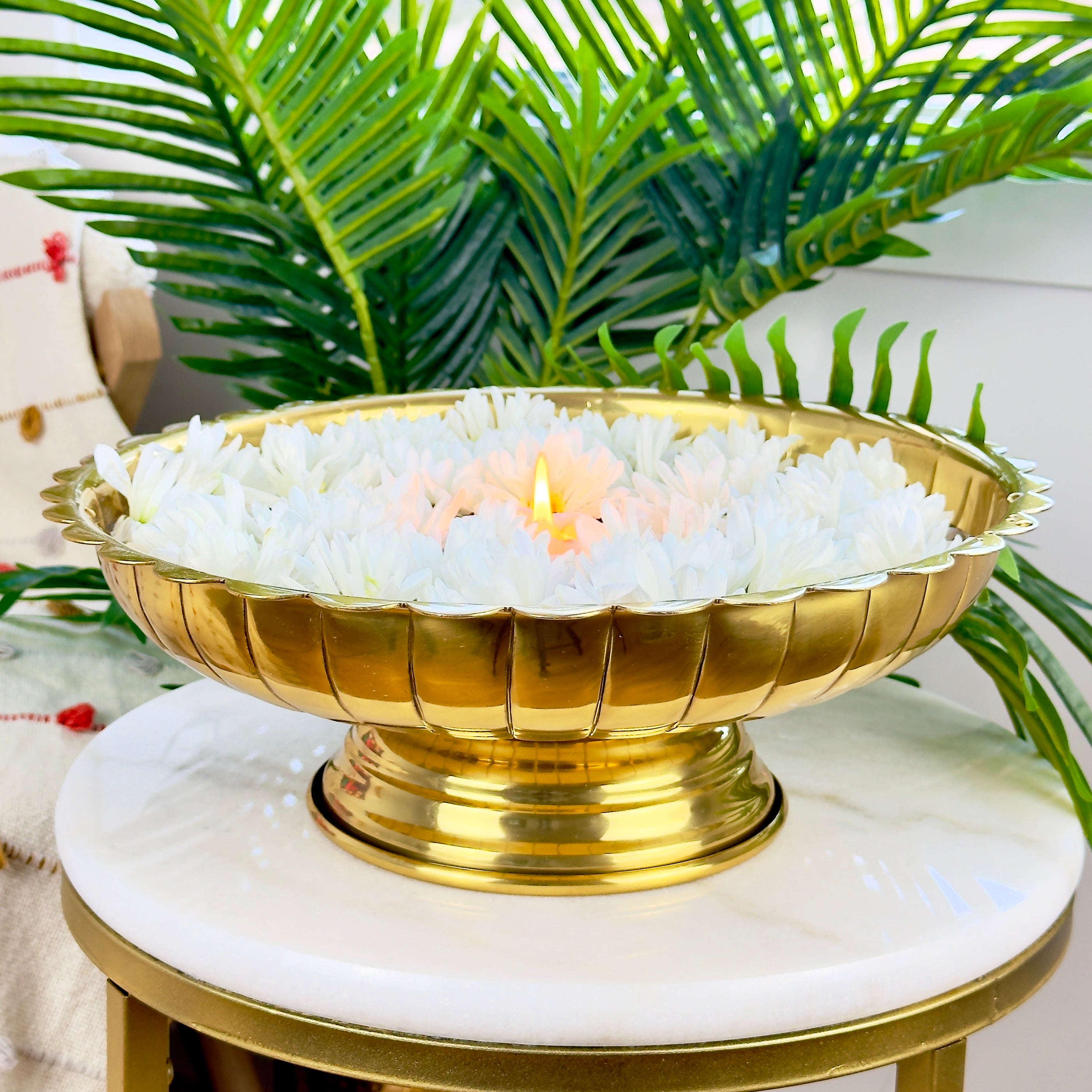 Product image of the Lotus Urli Gold from Indian Impressions, featuring a stunning lotus-inspired design with intricate detailing. Crafted with a polished gold finish, this urli is perfect for Vastu, home décor, festive decorations, or gifting, bringing elegance and positive energy to any space.