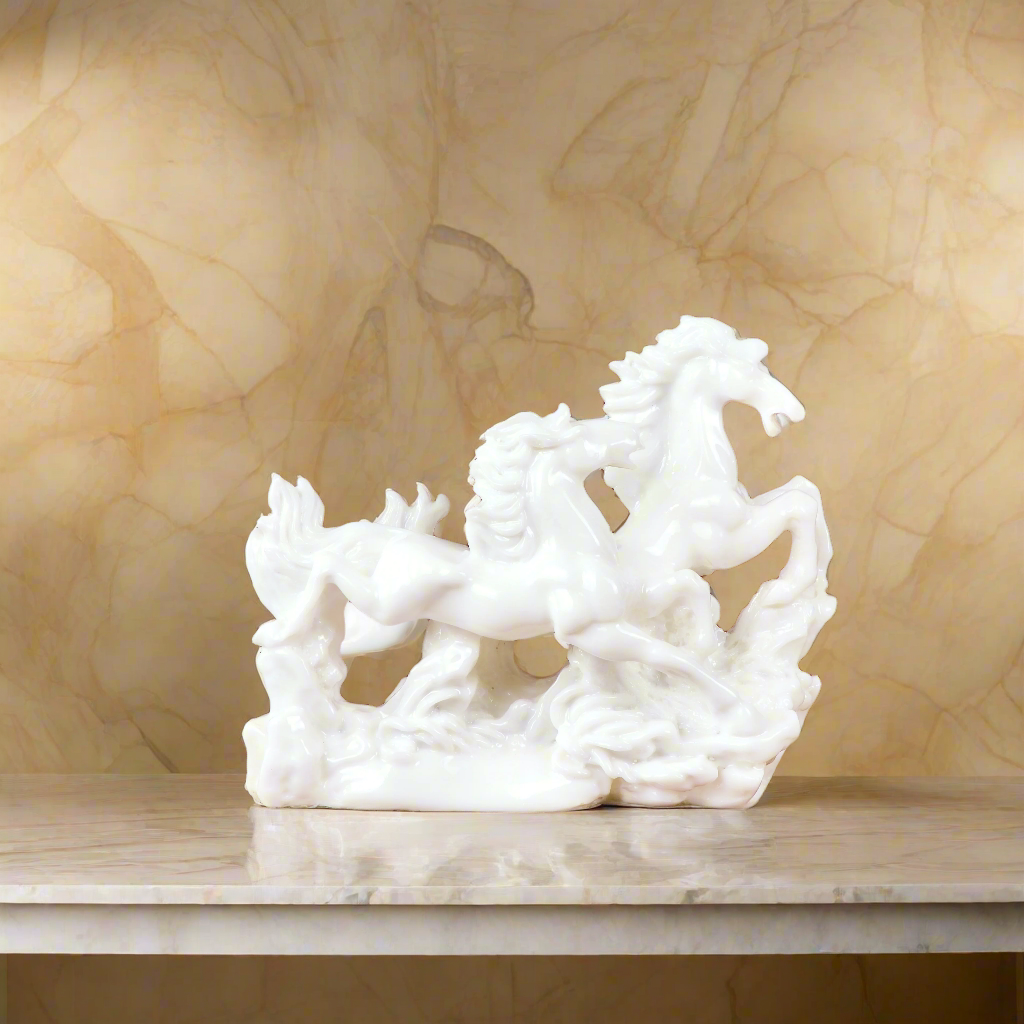 Product image of the Vastu Two White Horses from Indian Impressions, featuring two beautifully crafted white horse figurines symbolizing power, success, and positive energy. Perfect for Vastu corrections, home décor, or gifting, these horses add elegance and harmony to any space, bringing good fortune and strength.